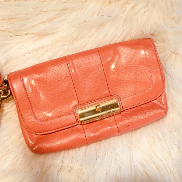 Coach Handbags - Coach coral wristlet 😍